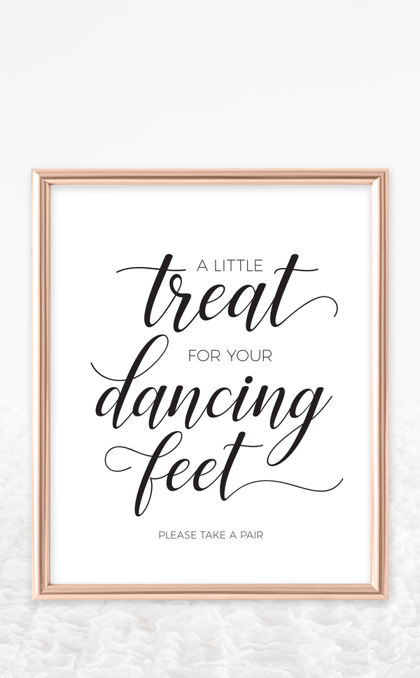 Dancing shoes sign at Wedding reception that reads "take a treat for your dancing feet"