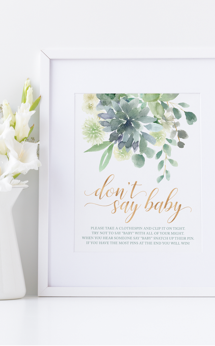 Framed baby shower game sign with succulents and greenery for Don't Say Baby clothespin game